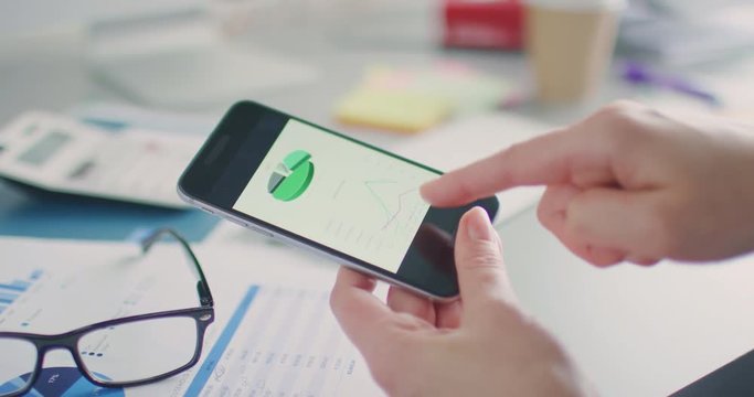 Businesswoman Hands Reviewing Business Plan On Smartphone 4K