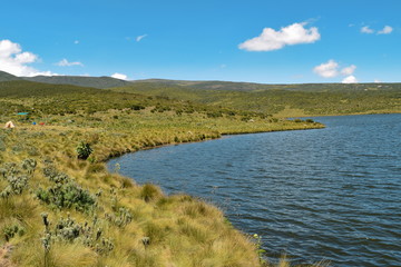 Fototapeta na wymiar Lake against a mountain background, Lake Ellis, Mount Kenya National Park, Kenya