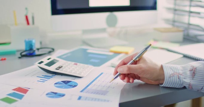 Closeup Of Financial Inspector Making Report At Office Desk 4K