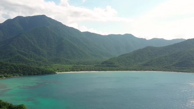 Aerial View at Tayrona National Park's Playa Cristal.. A Super Tropical Beach near Santa Marta, Colombia Surrounded by Mountains