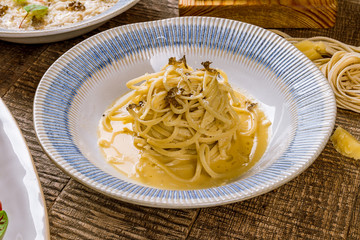 spaghetti with truffles on a plate