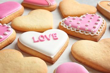 Decorated heart shaped cookies on table. Valentine's day treat