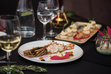 Lagustine tartare on christmas table. Tasty restaurant dish