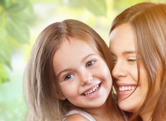 Happy Mother and daughter hugging