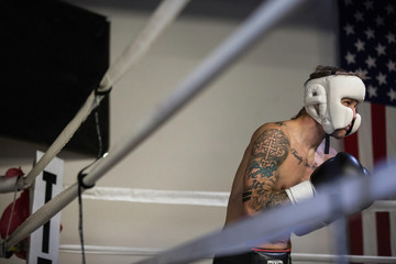 Boxer practicing boxing at gym