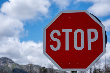 stop sign against blue sky