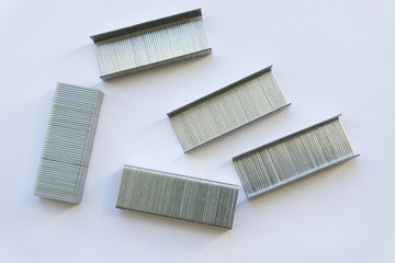 Metal clips for stapler for fastening papers