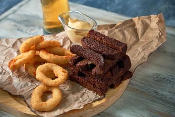 a variety of snacks for light beer in a glass