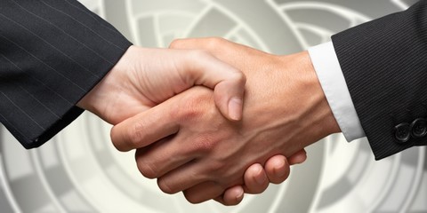 Obraz premium Business handshake and business people on background