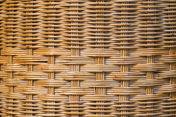 The brown surface is made of rattan, knit together with elaborate.