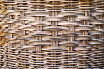 The brown surface is made of rattan, knit together with elaborate.
