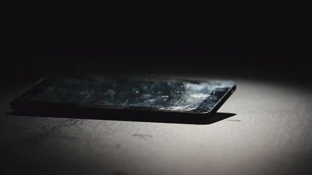 SLOW MOTION: Used Tablet PC falls on a floor