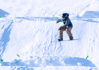 People are enjoying skiing	/ snowboarding	