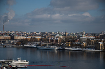 Fototapeta premium Stockholm waterfront a winter day islands in snow an ice