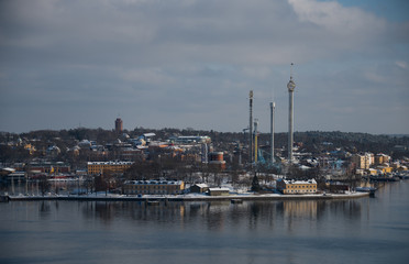 Fototapeta na wymiar Stockholm waterfront a winter day islands in snow an ice