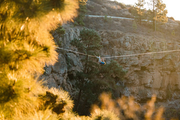 View of man slacklining during sunset