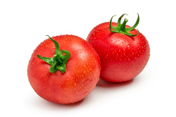 Tomatoes isolated on white background. Two fresh raw vegetables
