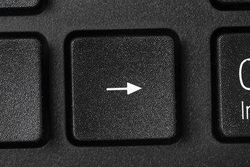 Black laptop keyboard close up