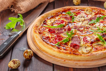 Delicious fresh pizza served on wooden table