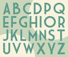 alphabet stylized reptile skin pattern in blue green shades