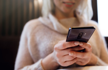 Payment Detail page display. Online payment. Women hands using s