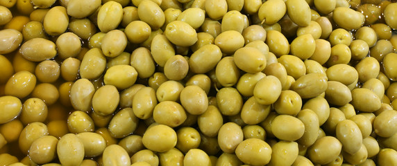 background of green ripe olives