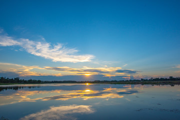 Obraz premium Sunset on lake in the summer , Evening sky Landscape Backgrounds