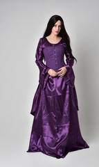 full length portrait of beautiful girl with long black hair,   wearing purple fantasy medieval...