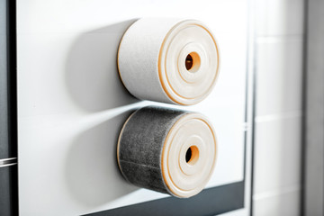 Board with new and used air filter at the car service