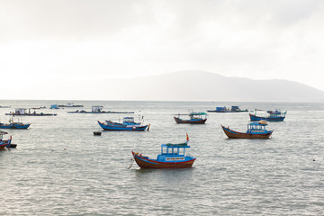 Naklejka na ściany i meble Fishing boats on the sea