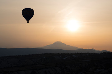 Hot Air Balloon Silhouette with sunny background 
