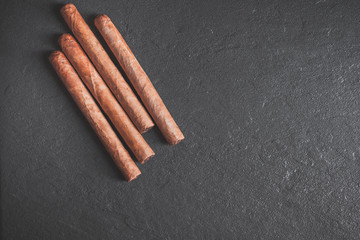 cigars on black background.  Copy spase