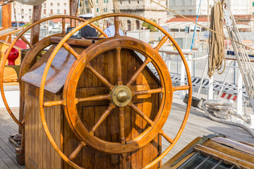 Detail view of the rudder of an old sailing ship in the port of Livorno, Tuscany, Italy