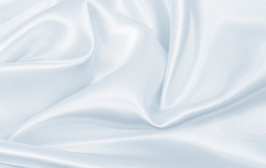 Smooth elegant grey silk or satin luxury cloth as wedding background. Luxurious background design