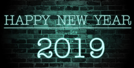 Happy New Year 2019 in neon on brick wall