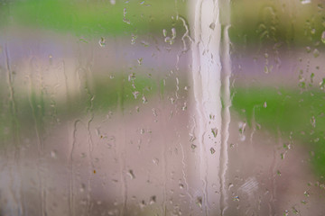 Drops after rain on the window as background