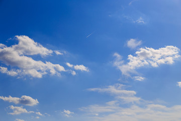 Clouds against blue sky as abstract background
