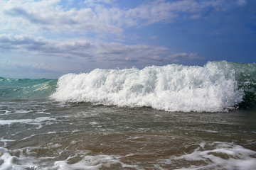 Crashing wave with white foam