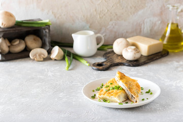 Béchamel baked pancakes stuffed with mushrooms
