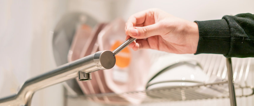 Hand Opens The Kitchen Water Faucet Tap Close Up F