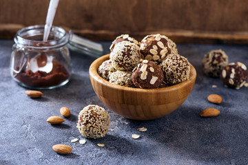 Energy bites snack, raw eating dessert with almond  and cacao, sesam and oats, vegan sweets