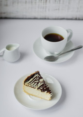 The cup of coffe and cake