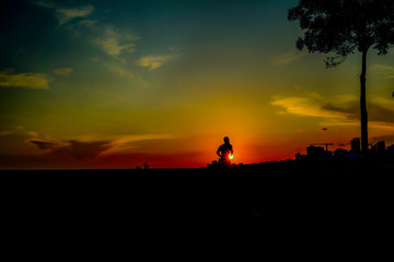 Fototapeta na wymiar silhouette of a man in the sunset