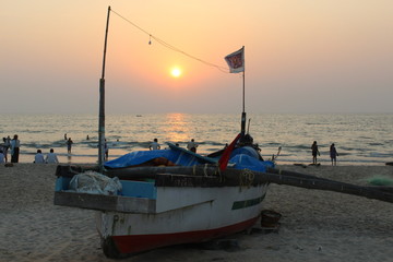 Fototapeta na wymiar Fishing boat at sunset