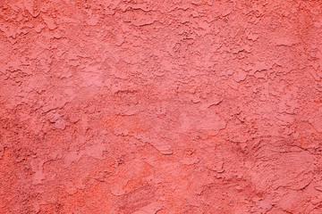 Fototapeta premium red concrete wall with rough pattern