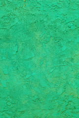 green concrete wall with rough pattern