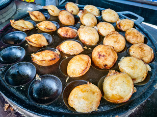 Khanom krok (Thai sweetmeat) or say coconut Rice Cake or Thai Coconut pudding