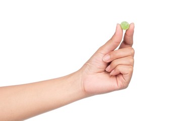 hand holding colorful candy, jellys sweet isolated on white background