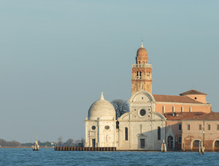 Fototapeta na wymiar Historical building in Venice, Italy. Sea and blue sky