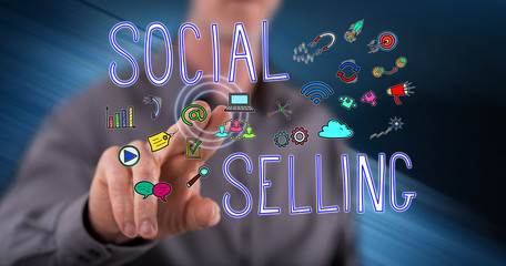 Man touching a social selling concept